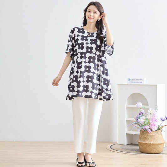 【M〜L】イラストフラワープリントフレアチュニック(N13-172A)|大胆花柄×体型カバーで春夏映え