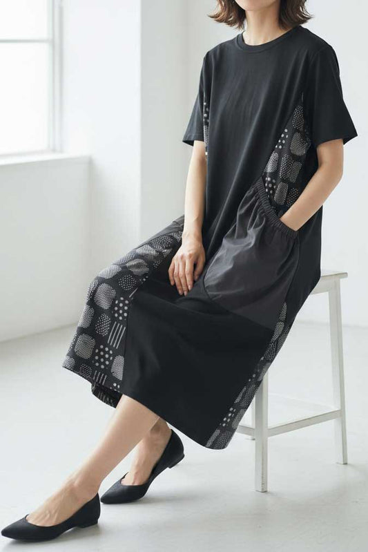 1枚で決まる洗練モード。大人の遊び心溢れる「幾何学柄 切り替え 半袖ワンピース」