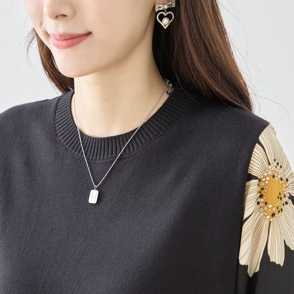 フラワープリント ドッキング ニットワンピース 花柄 長袖 異素材切替 きれいめ