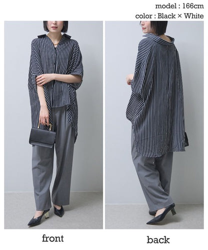 背面のデザイン。長めの着丈と縦のストライプラインが、後ろ姿をスマートに演出するバックショット。