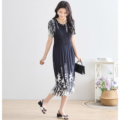 シック フローラル プリーツ ワンピース 半袖 花柄 総プリーツ 伸縮 ゆったり