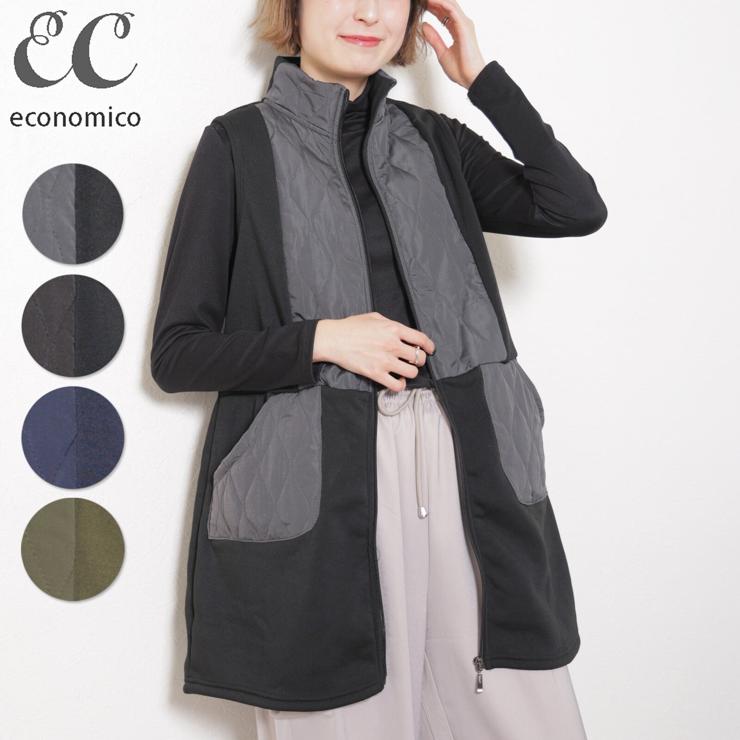 前を開けて着たロングベストを羽織る女性モデル（グレー×ブラック）