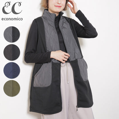 前を開けて着たロングベストを羽織る女性モデル（グレー×ブラック）