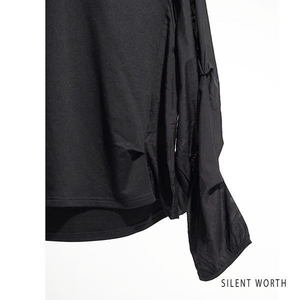 Mikonosublue Store black pullover with mixed material design, featuring voluminous pleated raglan sleeves.