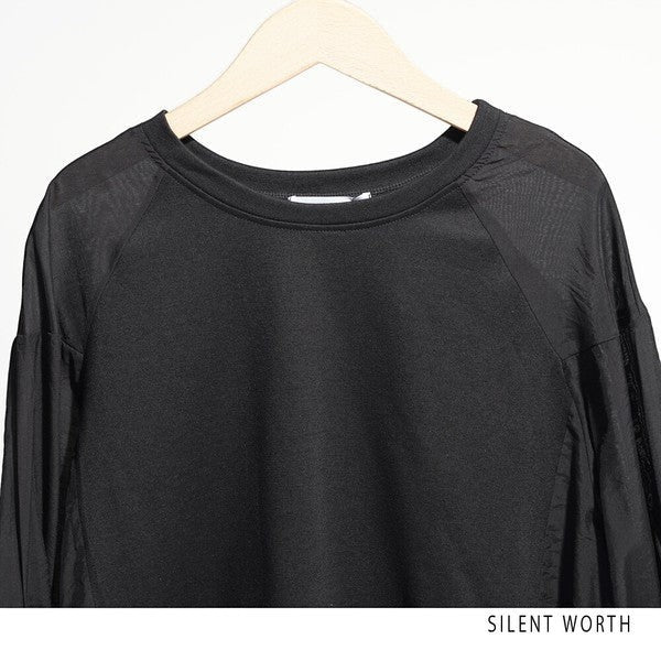 Mikonosublue Store black pullover with mixed material raglan sleeves and a voluminous tuck design