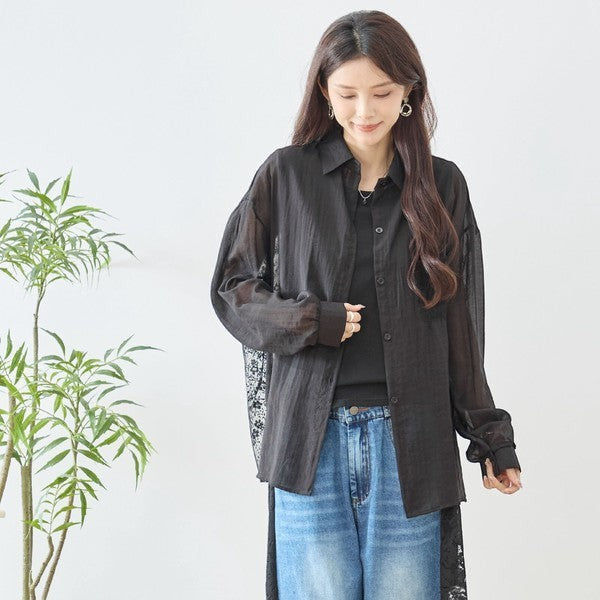 Mikonosublue Store black sheer long-sleeve shirt with floral lace paneling and button front.