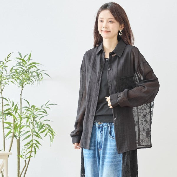 Mikonosublue Store black sheer long-sleeve shirt with floral lace paneling and button front.