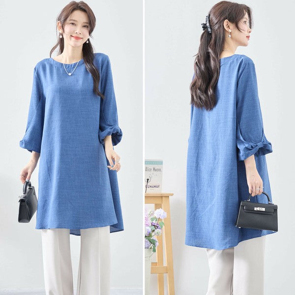 Mikonosublue Storeの青い袖リボン付きAラインチュニックワンピース。ゆったりとしたシルエットで体型カバーも叶うポリエステル素材の七分袖トップス。