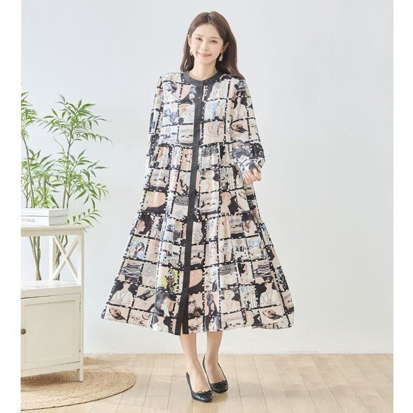 Mikonosublue Storeのレディコラージュ総柄ティアードシャツワンピース。スタンドカラーでゆったりとしたシルエットの長袖ロング丈。