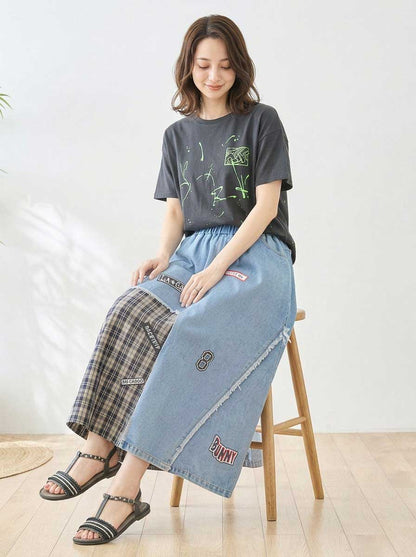 Mikonosublue Storeのデニムとチェック柄を組み合わせたパッチワークマキシスカート。ワッペンとフリンジが特徴のリメイク風デザイン。