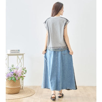 Mikonosublue Storeのデニムとチェック柄を切り替えたパッチワークマキシスカートを着用した後ろ姿