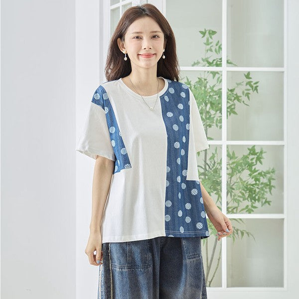 Mikonosublue Storeのドット柄と無地の異素材切り替え半袖トップス。ゆったりとしたAラインシルエットで体型カバーも叶うカジュアルな夏服。