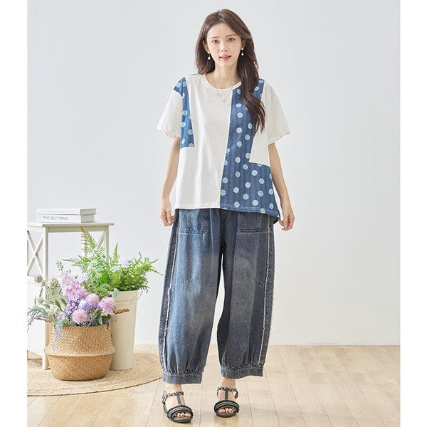 Mikonosublue Storeのドット柄と無地の異素材切り替え半袖トップス。ゆったりしたAラインシルエットで体型カバーも叶うコットン混の夏用カットソー。