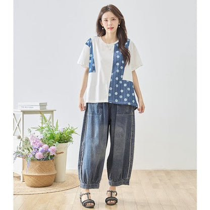 Mikonosublue Storeのドット柄と無地の異素材切り替え半袖トップス。ゆったりしたAラインシルエットで体型カバーも叶うコットン混の夏用カットソー。