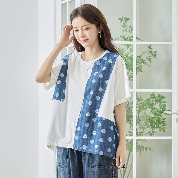 Mikonosublue Storeのドット柄と無地の異素材切り替え半袖トップス。ゆったりとしたAラインシルエットで体型カバーも叶う夏用カットソー。