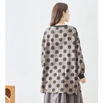 Mikonosublue Storeのドット柄チュニックプルオーバー。ボリューム袖とリブ切り替えが特徴のゆったりとした秋冬用オーバーサイズトップス