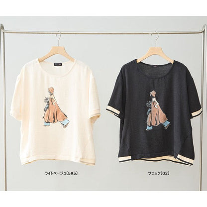 Mikonosublue Storeのファッションイラストプリント半袖トップス。ライトベージュとブラックの2色展開で、配色リブとゆったりしたドロップショルダーが特徴。