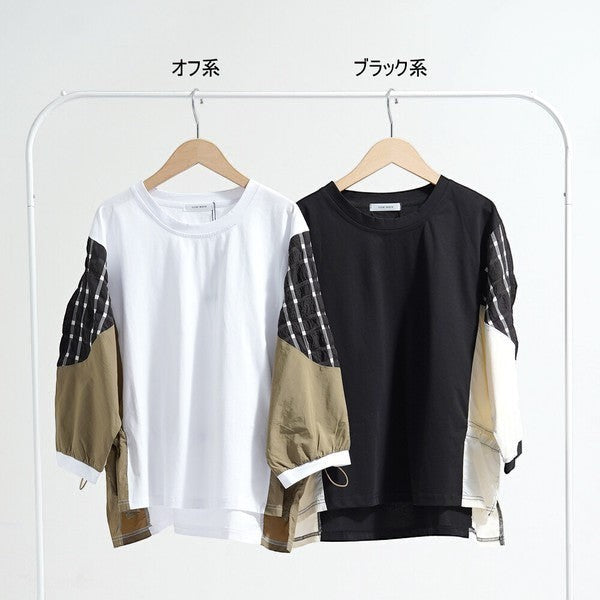 Mikonosublue Storeの異素材切替プルオーバー。オフ系とブラック系の2色展開で、袖のチェック柄とウエストドロストが特徴のゆったりとしたビッグシルエットトップス。