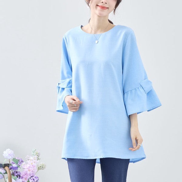 Mikonosublue Storeの袖リボン付きライトブルーの七分袖Aラインチュニックブラウス