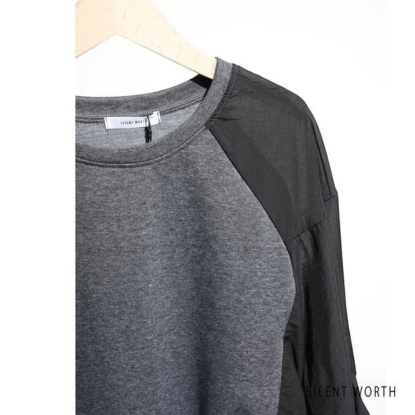 Mikonosublue Store grey and black mixed-material pullover with raglan sleeves and a relaxed fit