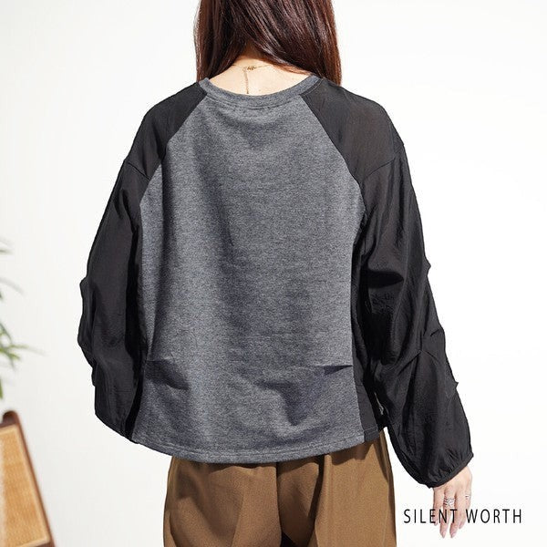 Mikonosublue Store grey and black mixed-material pullover with voluminous raglan tuck sleeves for a relaxed fit
