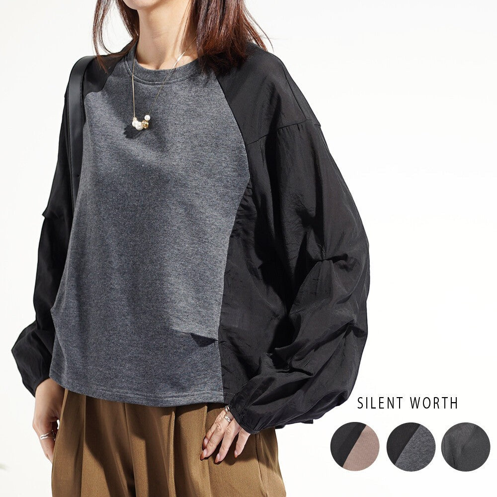 Mikonosublue Store grey and black mixed-material pullover with voluminous raglan tuck sleeves and a relaxed fit.