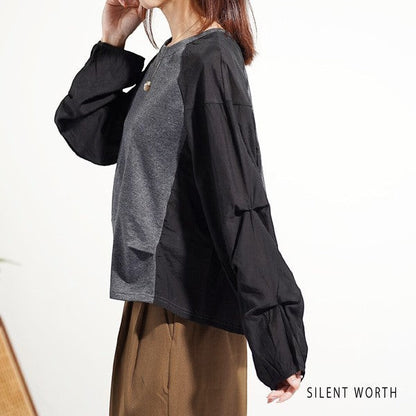 Mikonosublue Store grey and black mixed-material pullover with voluminous raglan tuck sleeves and a loose fit