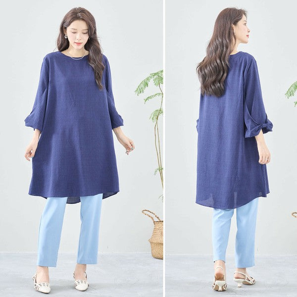 Mikonosublue Storeの袖リボン付きネイビーAラインチュニックワンピース。ゆったりとしたシルエットで体型カバーも叶う七分袖。