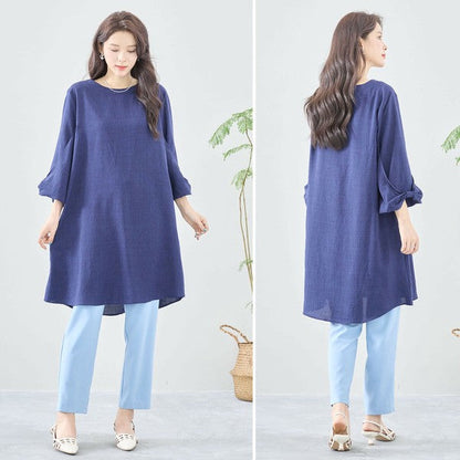 Mikonosublue Storeの袖リボン付きネイビーAラインチュニックワンピース。ゆったりとしたシルエットで体型カバーも叶う七分袖。