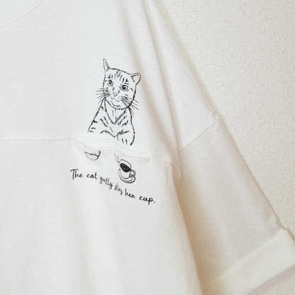 Mikonosublue Storeの猫プリントが施された白の綿100%半袖チュニックTシャツ、ドロップショルダーのゆったりとしたシルエット