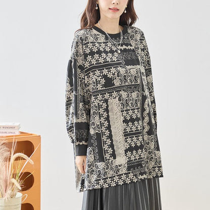 Mikonosublue Storeのレース調パネルフラワー柄がパッチワーク風に施された、ゆったりシルエットの長袖チュニックプルオーバー