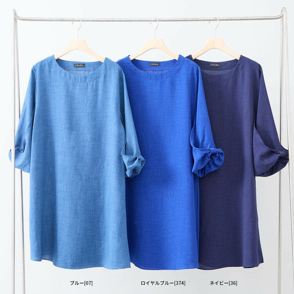 Mikonosublue Storeの袖リボン付きチュニックワンピース。ブルー、ロイヤルブルー、ネイビーの3色展開で、ゆったりとしたAラインシルエットの七分袖。
