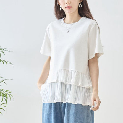 Mikonosublue Storeの裾にアシンメトリーなプリーツフリルをあしらった、ホワイトの異素材切り替え半袖Tシャツ