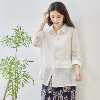 Mikonosublue Store white sheer long-sleeve blouse with floral lace details and a relaxed fit.
