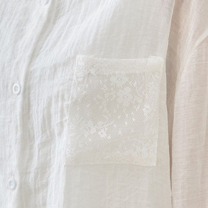 Mikonosublue Store white sheer long-sleeve blouse with floral lace pocket detail and button front.