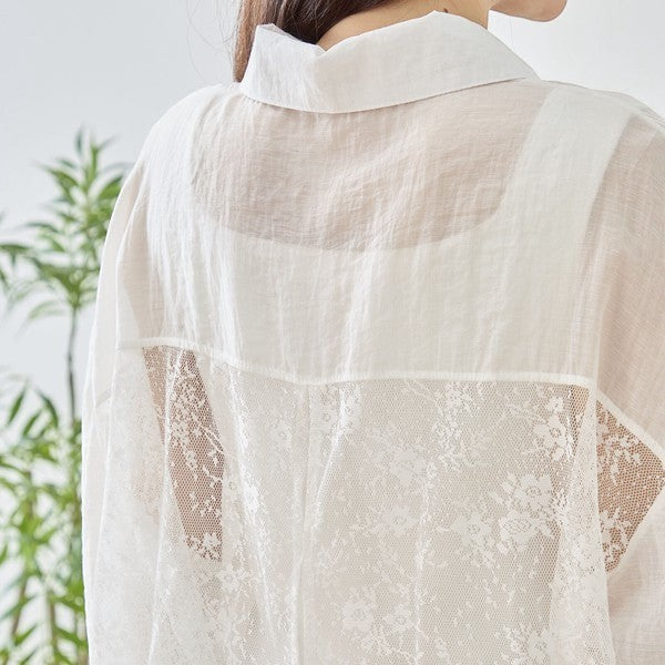 Mikonosublue Store white sheer long sleeve blouse with floral lace paneling and a relaxed fit.