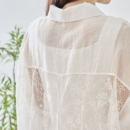 Mikonosublue Store white sheer long sleeve blouse with floral lace paneling and a relaxed fit.