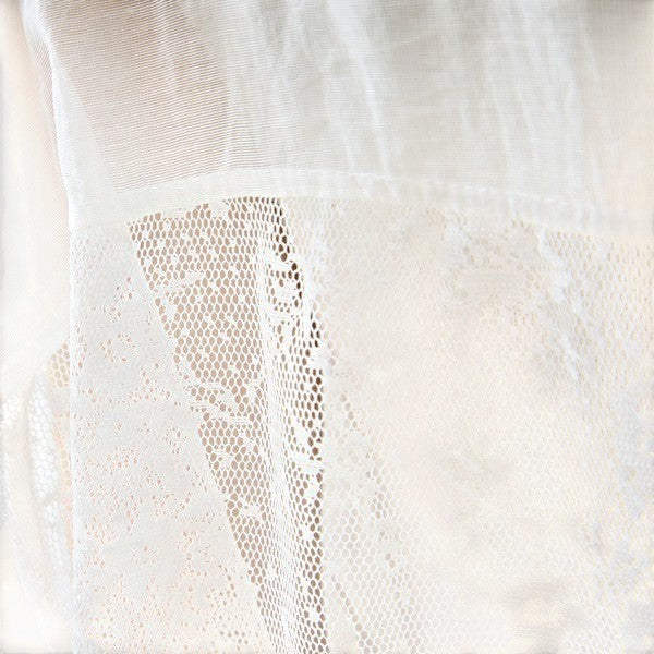 Mikonosublue Store white sheer long sleeve blouse with floral lace panel details and a relaxed fit.