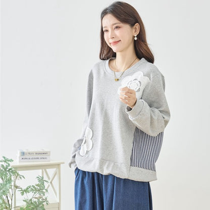 【M〜L】フラワーモチーフ異素材ストライプ切替プルオーバー｜TRUBE